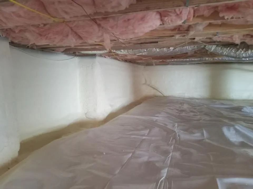 Crawl space encapsulation with closed-cell spray foam for Roof Leak Repair in DeWitt